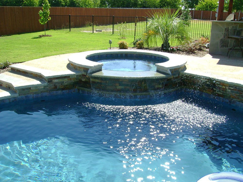 RiverMist pool at night, lit up and inviting